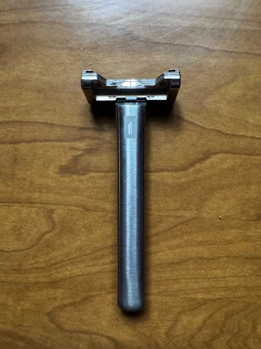 OneBlade razor with leather case, metal stand, and blades